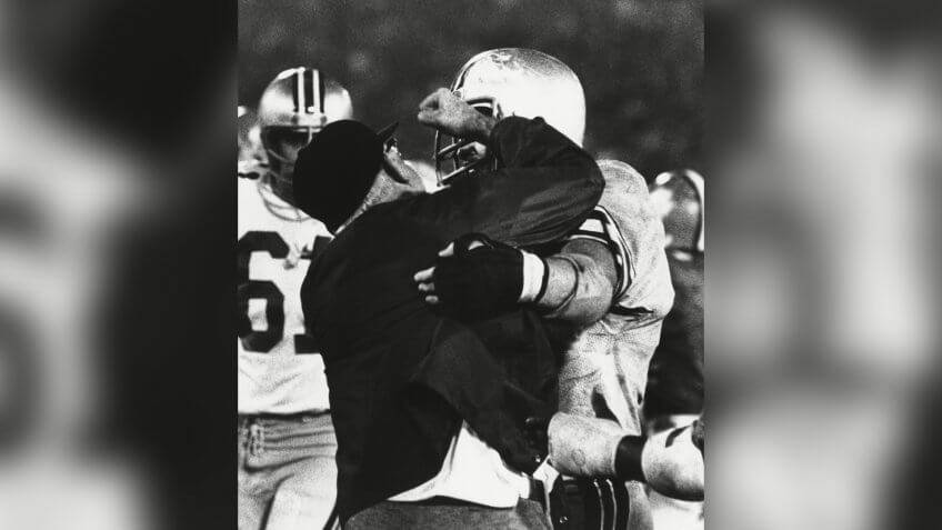 Ohio State head coach Woody Hayes punches team player after a fight during Gator Bowl in 1978. ...