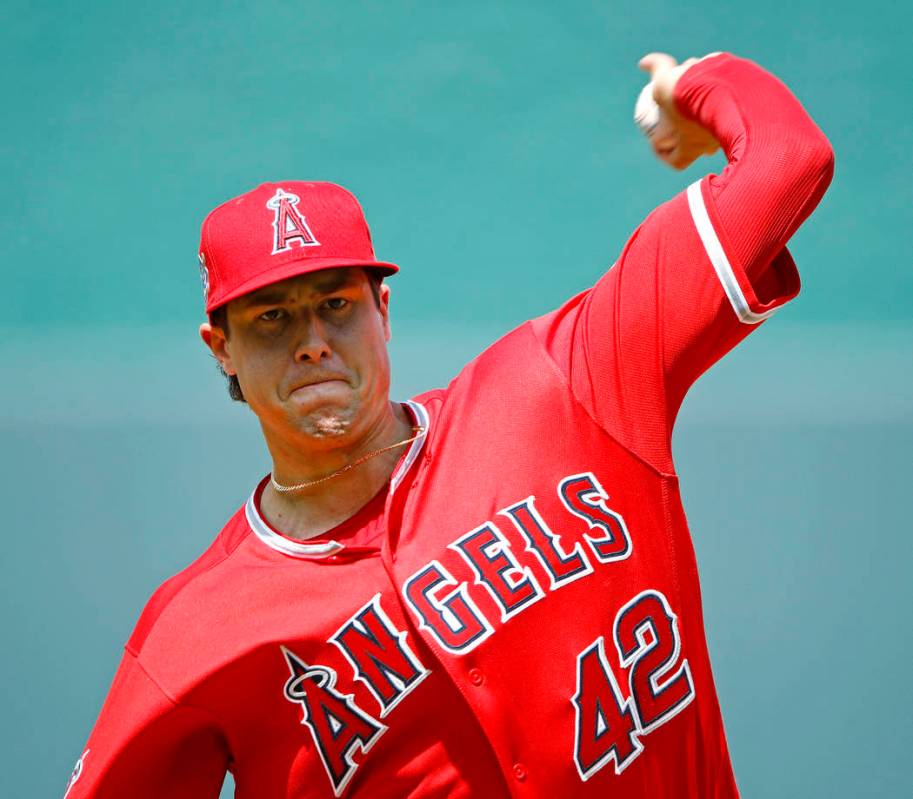 Los Angeles Angels starting pitcher Tyler Skaggs throws during a game against the Kansas City R ...