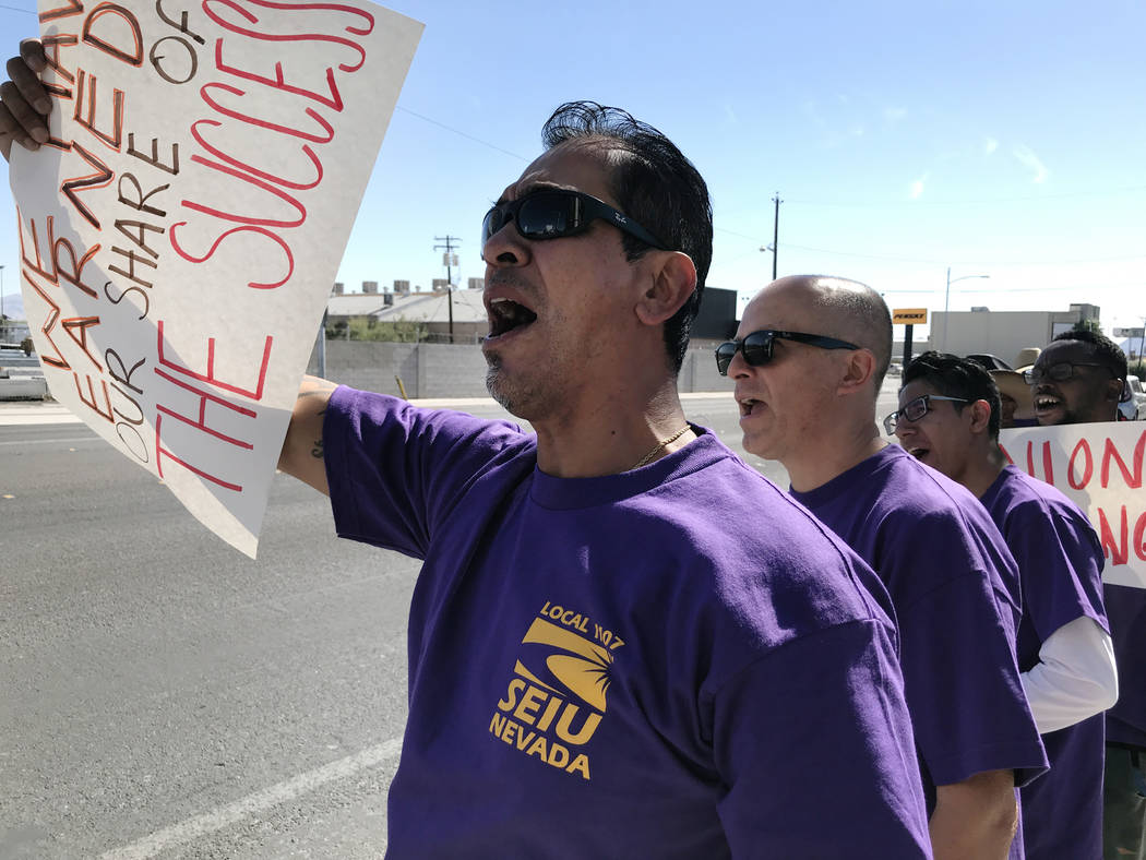 Jesse Mendiola, member of the Service Employees International Union, pickets outside the Las Ve ...