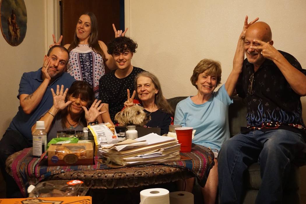 Gail Sacco poses for a silly photo with her family. From left to right: her son Joe Sacco Jr., ...