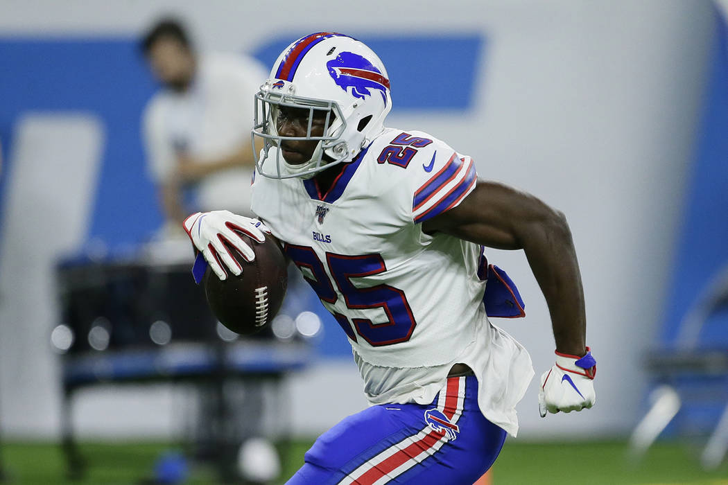 Buffalo Bills running back LeSean McCoy runs the ball before an NFL preseason football game aga ...