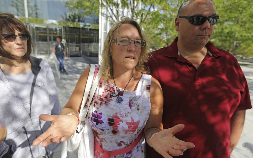 Tova Keblish, center, speaks with a reporter outside the federal courthouse after a jury reache ...