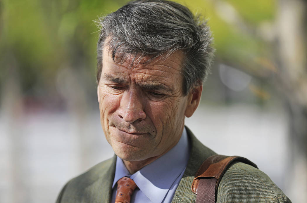 Defense attorney Greg Skordas speaks with reporters outside the federal courthouse, Friday, Aug ...