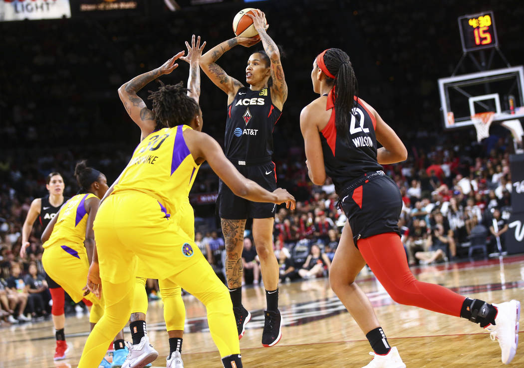 Las Vegas Aces' Tamera Young (1) shoots against the Los Angeles Sparks during the first half of ...