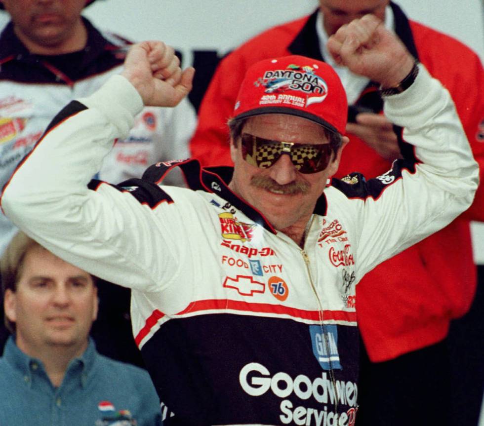 Dale Earnhardt has Victory Lane reflected in his sunglasses as he celebrates winning the Dayton ...