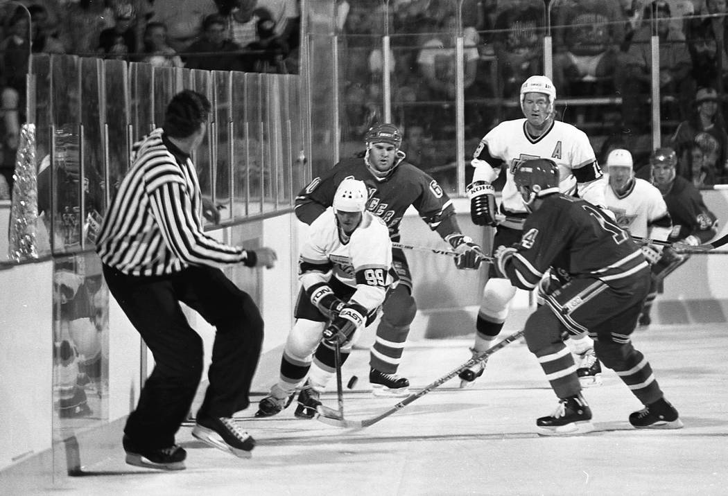 Scenes from an outdoor NHL exhibition game between the New York Rangers and the Los Angeles Kin ...