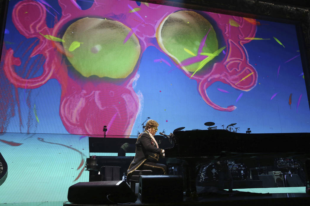 Elton John performs onstage during his "Farewell Yellow Brick Road" final tour at Mad ...