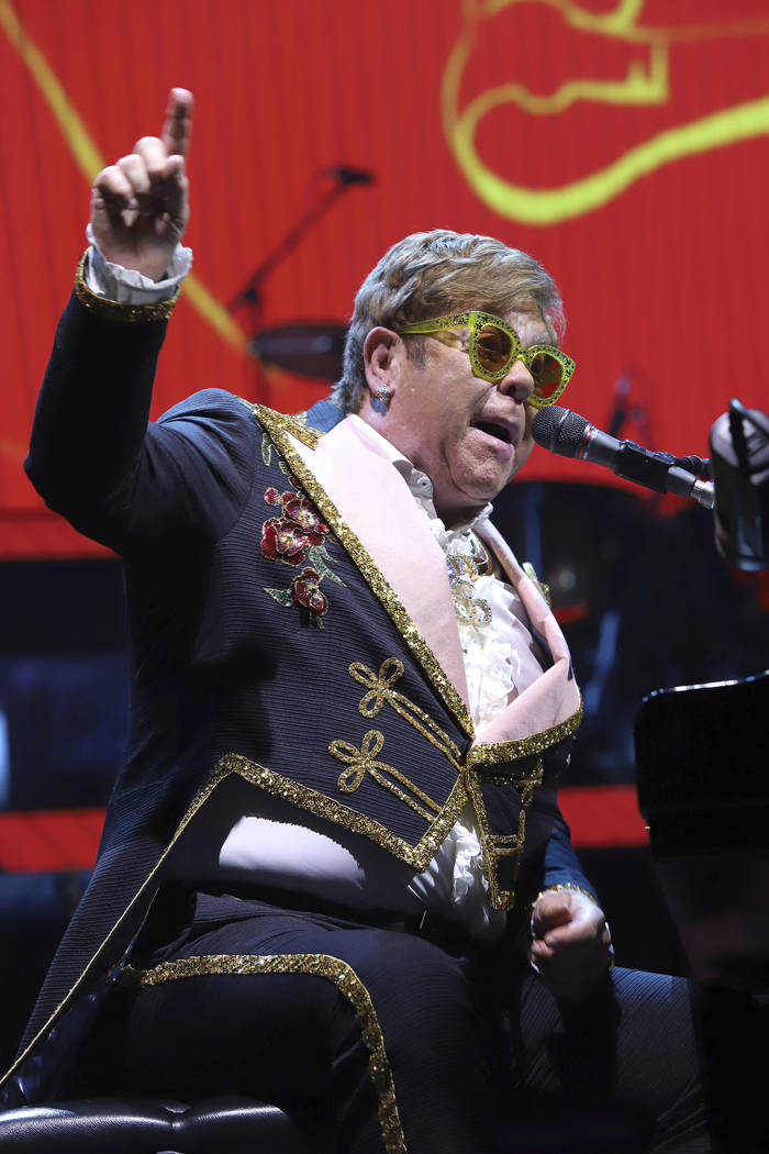 Elton John performs onstage during his "Farewell Yellow Brick Road" final tour at Mad ...