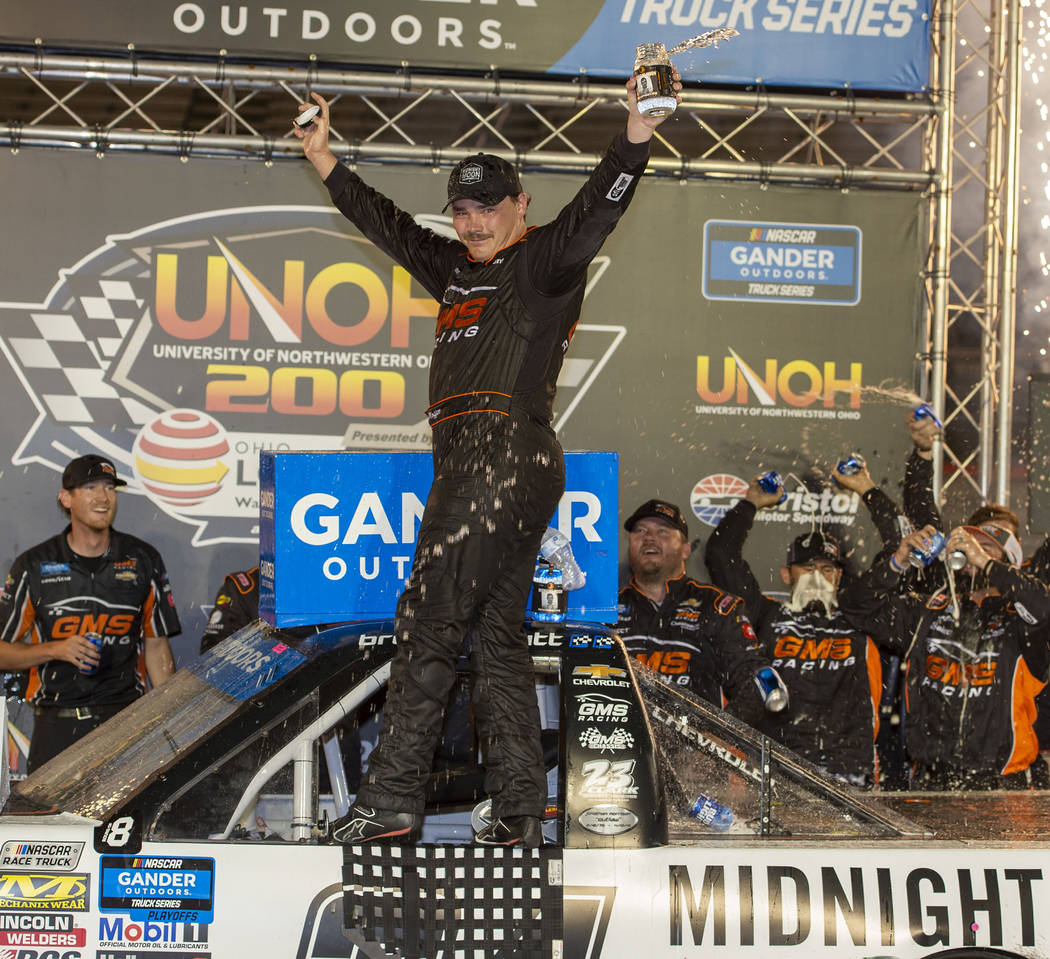 Brett Moffitt celebrates in Victory Lane after winning the NASCAR Truck Series auto race Thursd ...