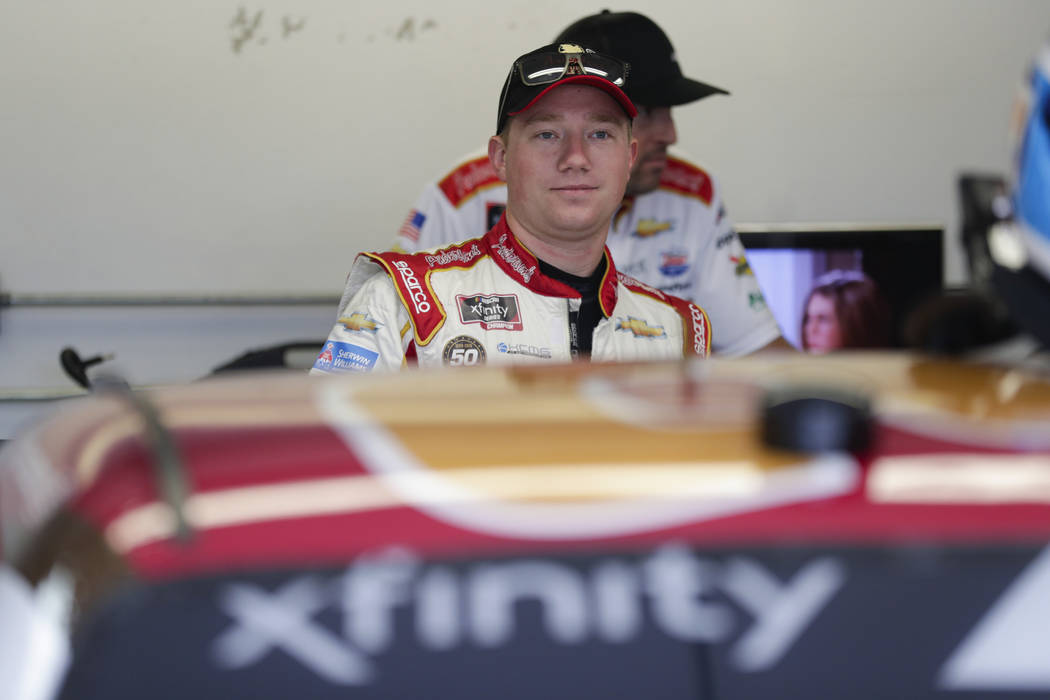 NASCAR Xfinity Series driver Tyler Reddick waits in the garage area before the start of NASCAR ...