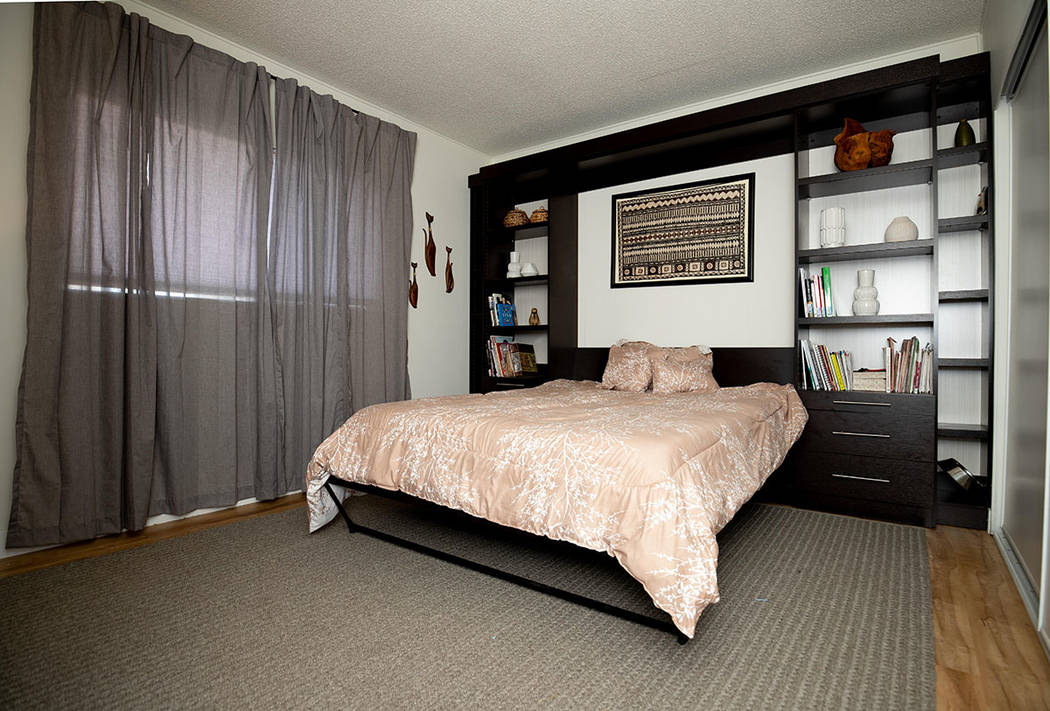 The master bedroom features new flooring and a built-in bookcase. (Tonya Harvey/ Real Estate Mi ...