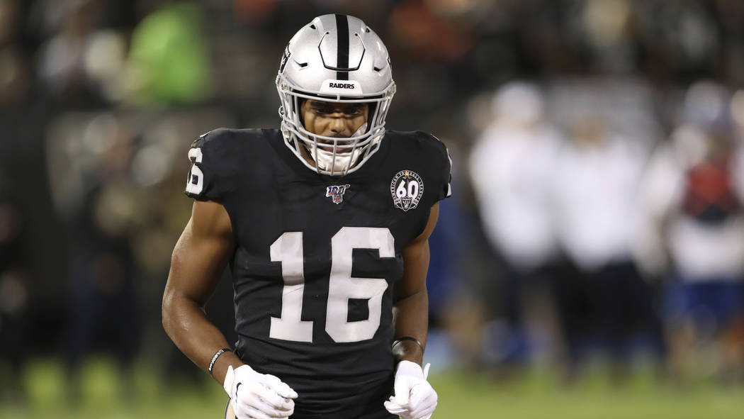 Oakland Raiders wide receiver Tyrell Williams (16) runs to his spot on the line before the snap ...