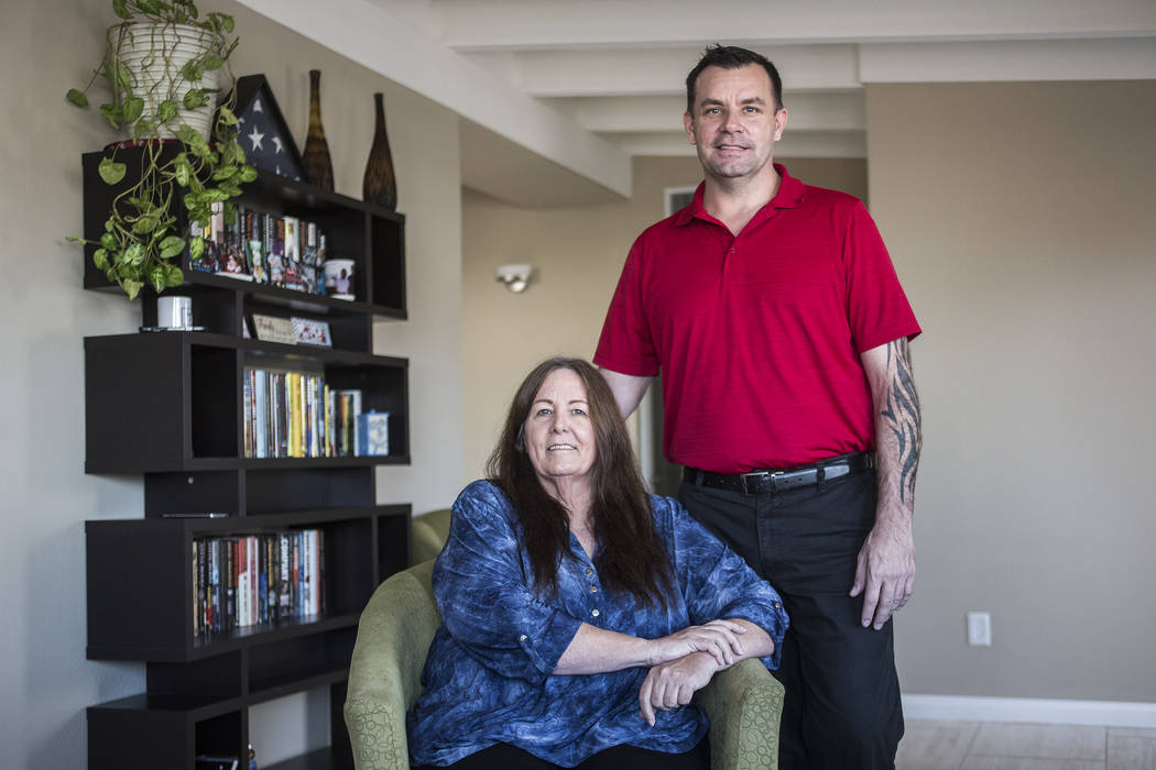 Michael Russell with his mother, Jill Drysdale, at their home in Las Vegas on Jan. 11, 2019. (R ...