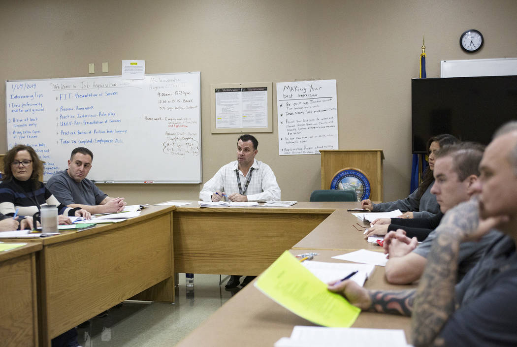 Michael Russell leads a Moral Recognition Therapy class at Casa Grande, a transitional housing ...