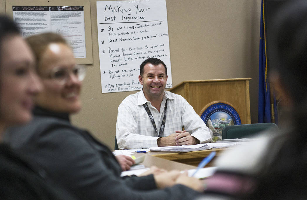 Michael Russell leads a Moral Recognition Therapy class at Casa Grande, a transitional housing ...