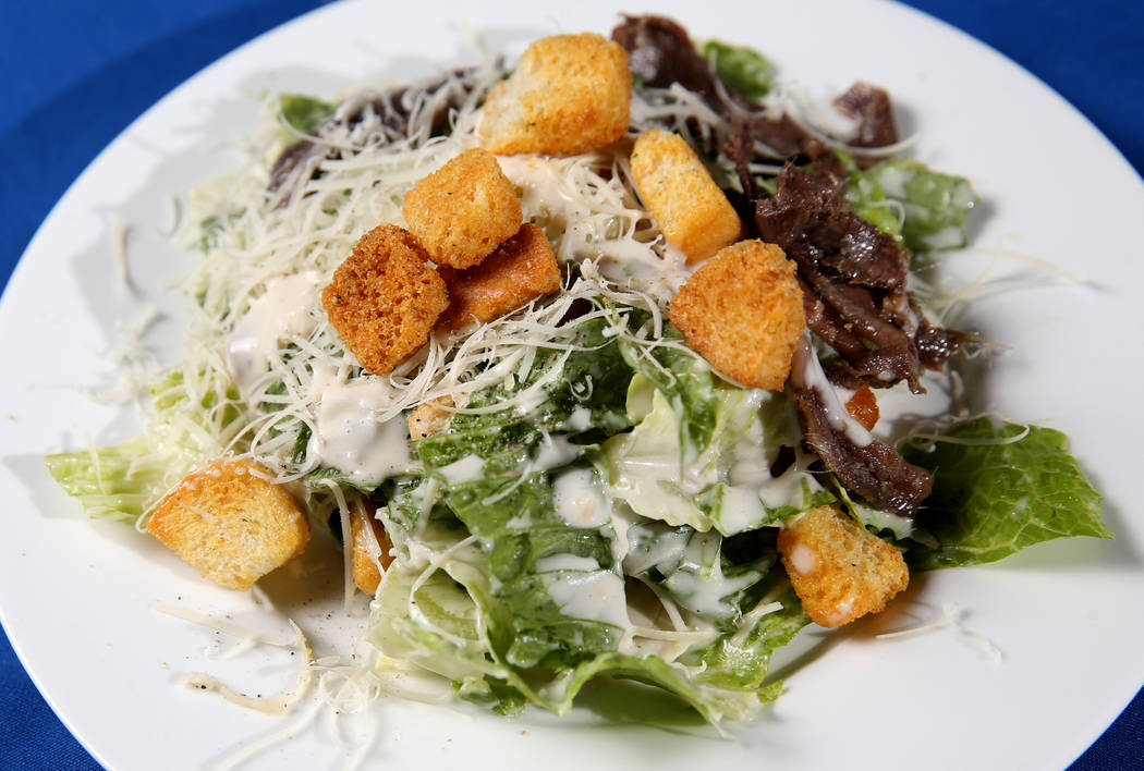 Caesar salad made tableside at Hugo's Cellar at Four Queens in downtown Las Vegas Friday, Aug. ...