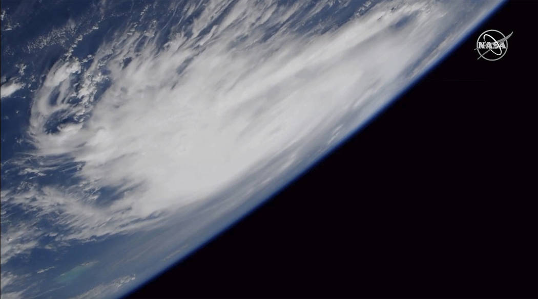 This Friday, Aug. 30, 2019 image provided by NASA shows a view of Hurricane Dorian from the Int ...