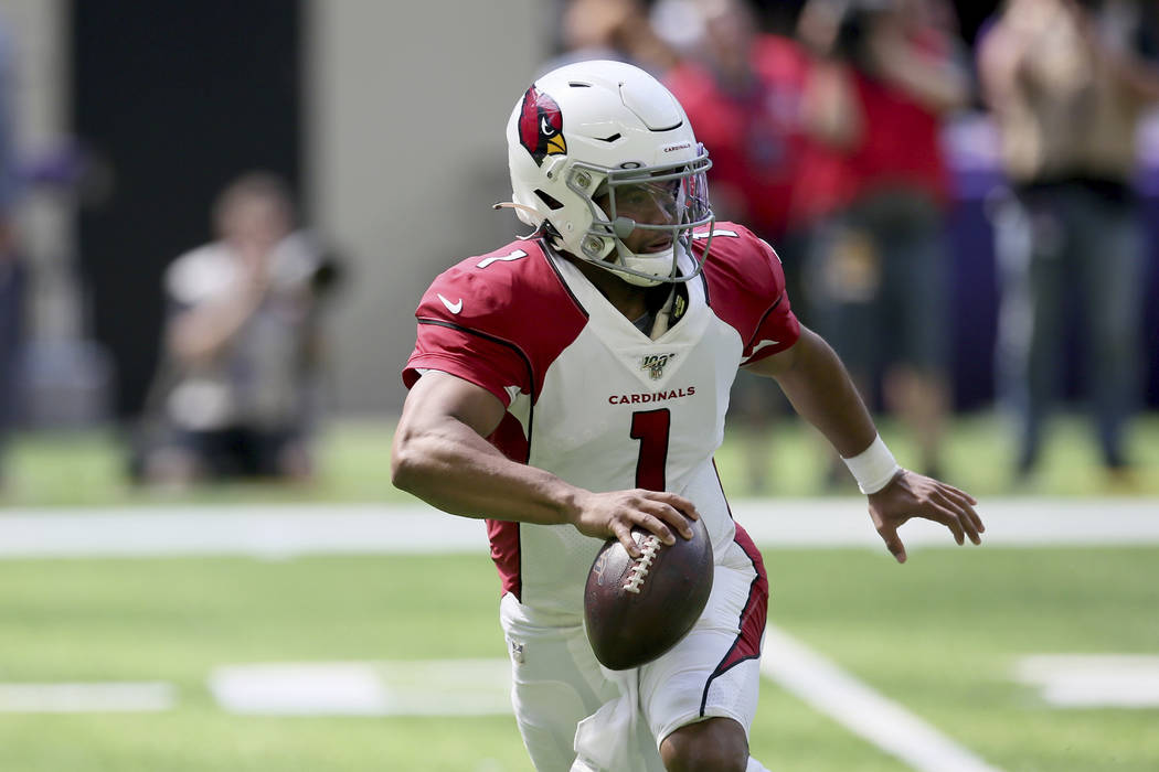 Arizona Cardinals quarterback Kyler Murray looks to pass during the first half of an NFL presea ...