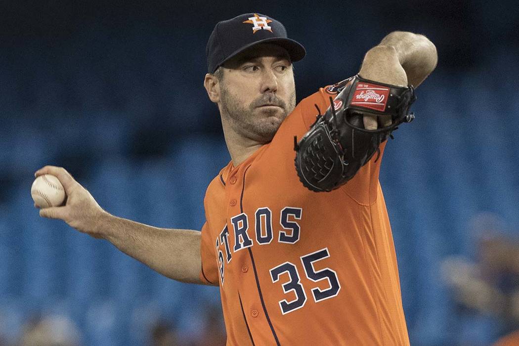 Houston Astros starting pitcher Justin Verlander throws against the Toronto Blue Jays during th ...