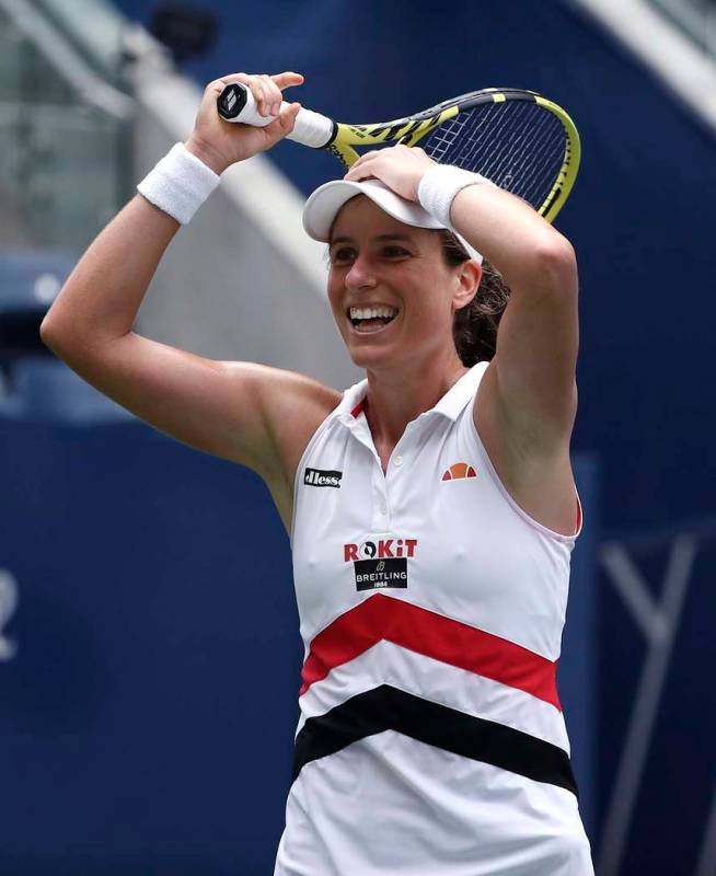 Johanna Konta, of the United Kingdom, reacts after defeating Karolina Pliskova, of the Czech Re ...