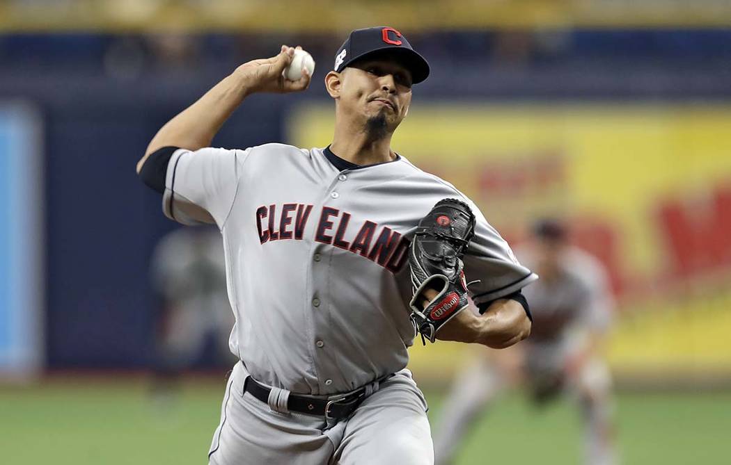 Cleveland Indians pitcher Carlos Carrasco delivers to the Tampa Bay Rays during the seventh inn ...