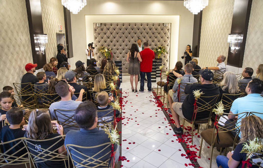 Vegas Golden Knights player Ryan Reaves conducts a marriage vows renewal ceremony for Laura and ...