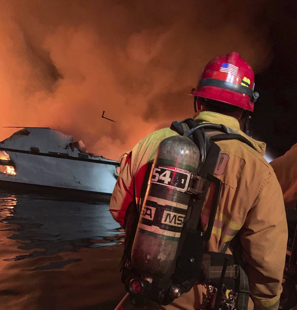 In this photo provided by the Ventura County Fire Department, VCFD firefighters respond to a bo ...