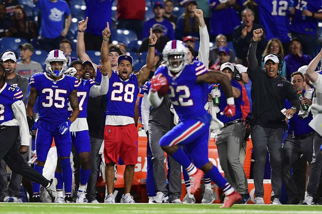 Buffalo Bills running back Marcus Murphy (22) heads for the end zone for a touchdown during the ...