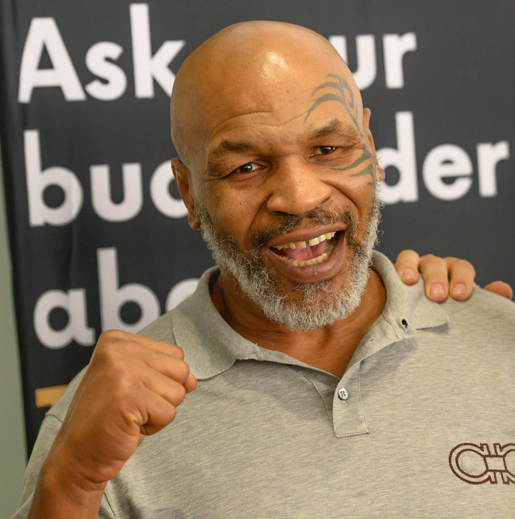 Mike Tyson is shown greeting fans at the Source cannabis dispensary in Henderson on Saturday, A ...