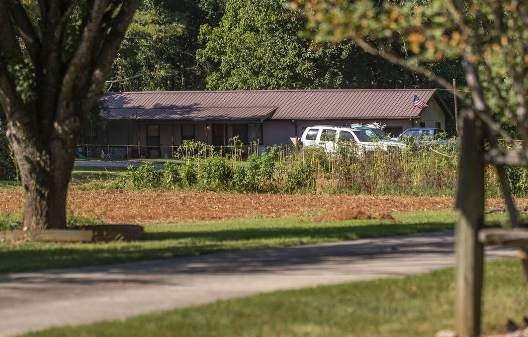 Authorities work at the scene of a shooting, Tuesday, Sept. 3, 2019, in Elkmont, Ala. la. A 14- ...