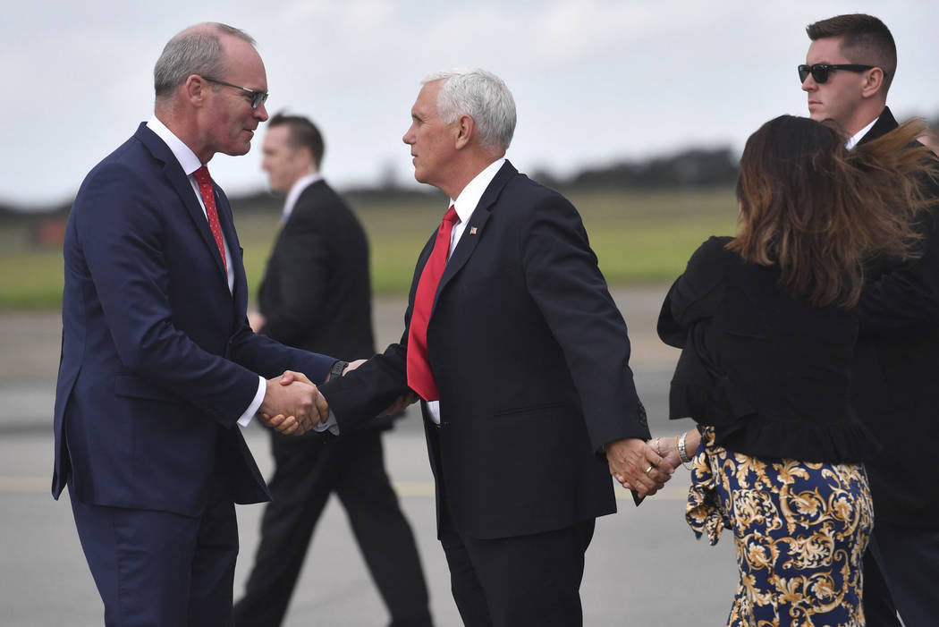 Ireland's Minister of foreign affairs Simon Coveney, left, meets US Vice President Mike Pence a ...