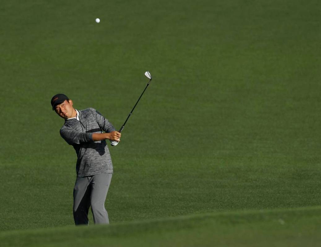 Doug Ghim hits a shot on the second hole during the second round at the Masters golf tournament ...