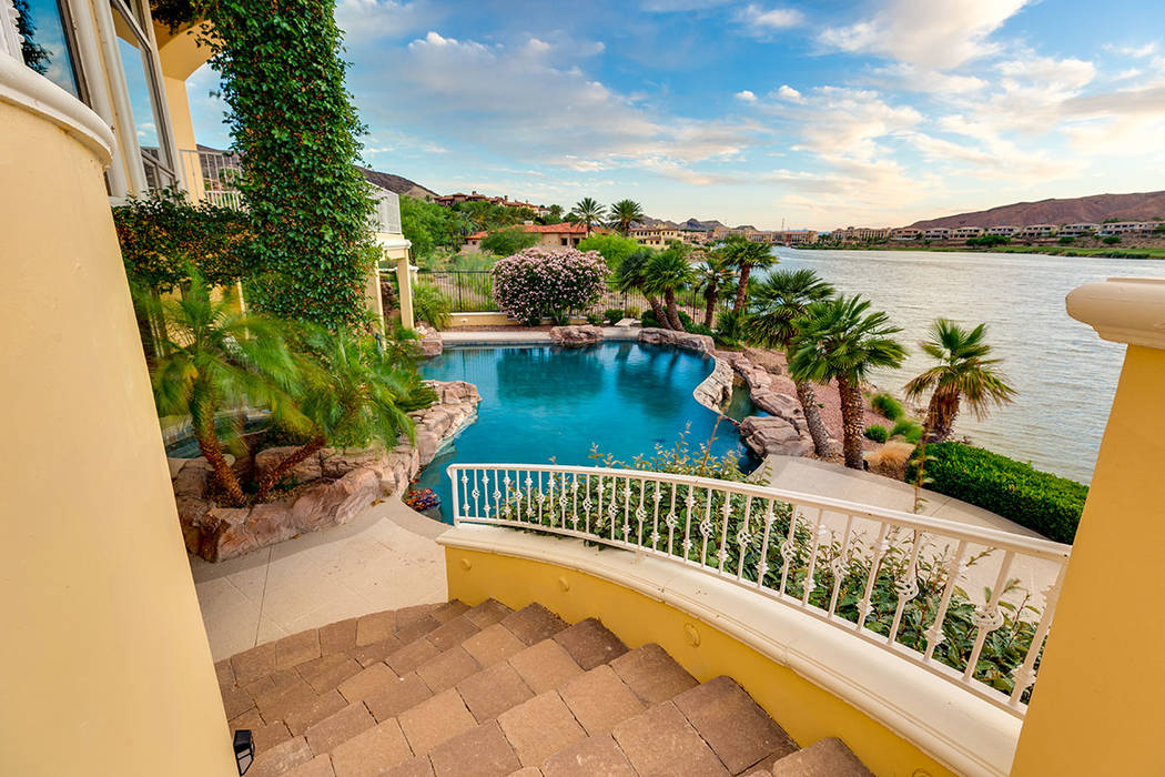 Stairs from one wing of the house leads to the pool area. (Ivan Sher Group)