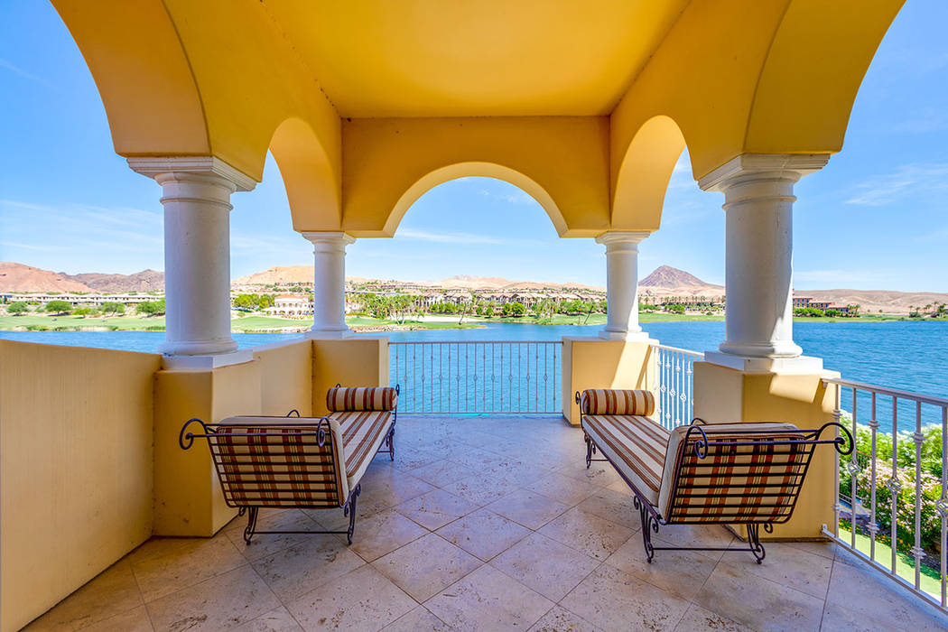 A covered patio faces the lake. (Ivan Sher Group)