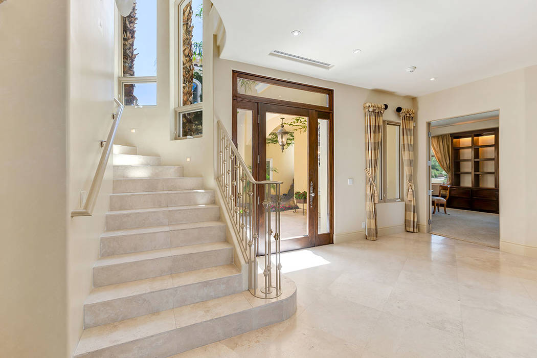 The stairs is off the entrance to the home. (Ivan Sher Group)