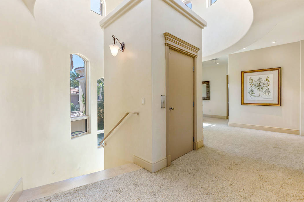 An elevator connects the two levels of the home. (Ivan Sher Group)