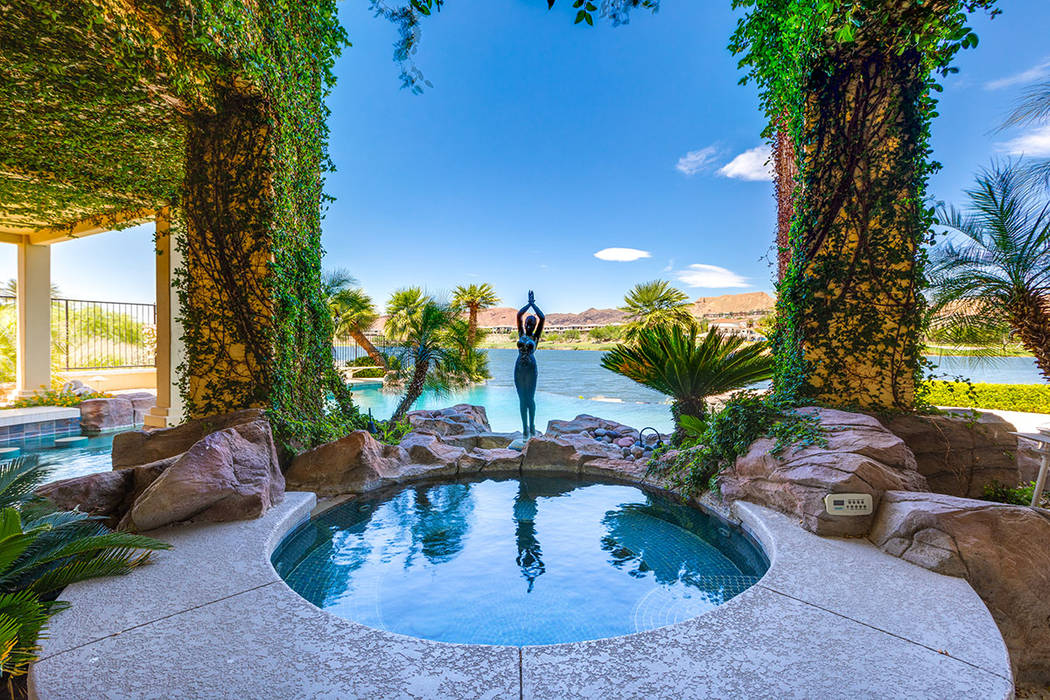 The spa is adorned with a sculpture and sweeping views of the lake. (Ivan Sher Group)