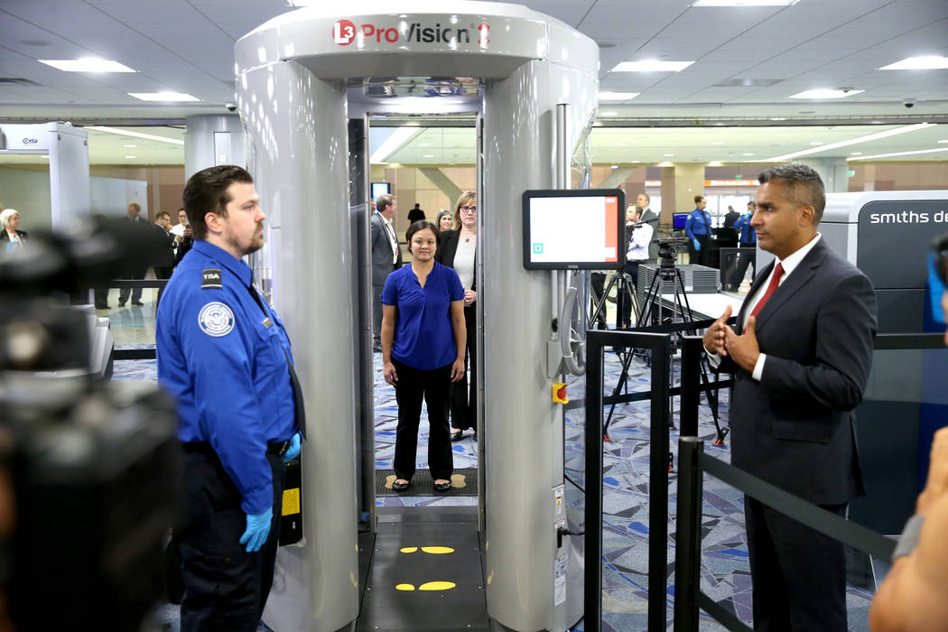 Jose Bonilla, director of Transportation Security Administration Innovation Task Force, right, ...