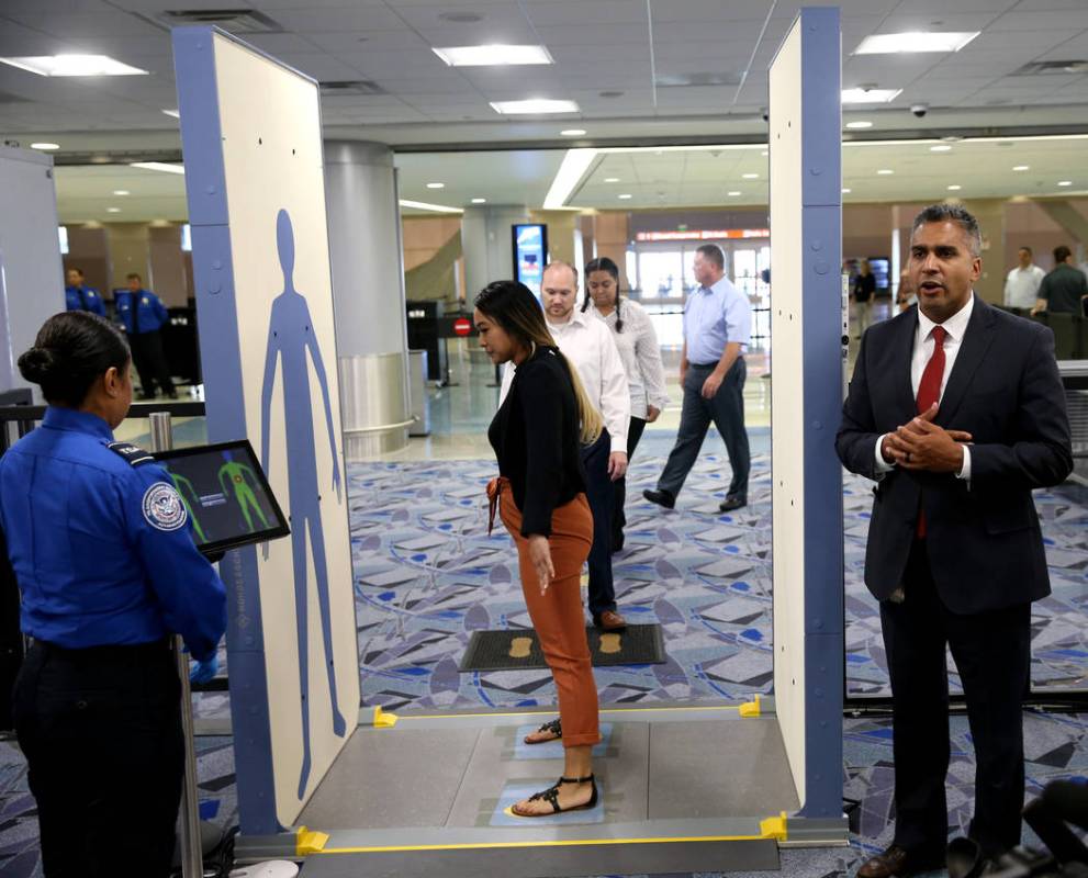 Jose Bonilla, director of Transportation Security Administration Innovation Task Force, right, ...