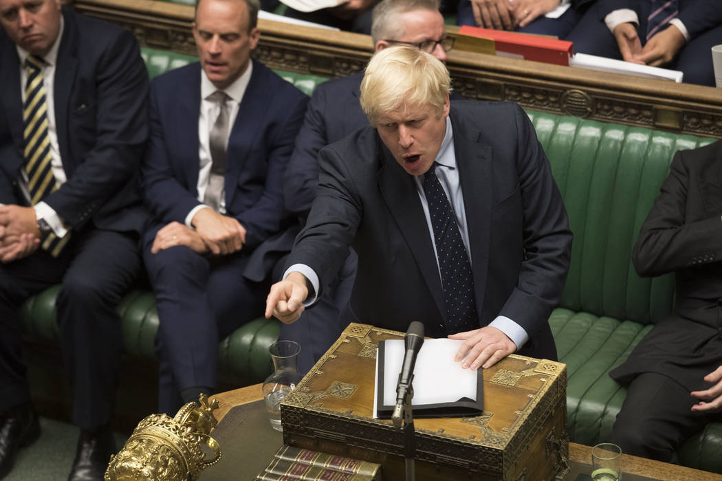 In this image released by the House of Commons, Britain's Prime Minister Boris Johnson speaks i ...