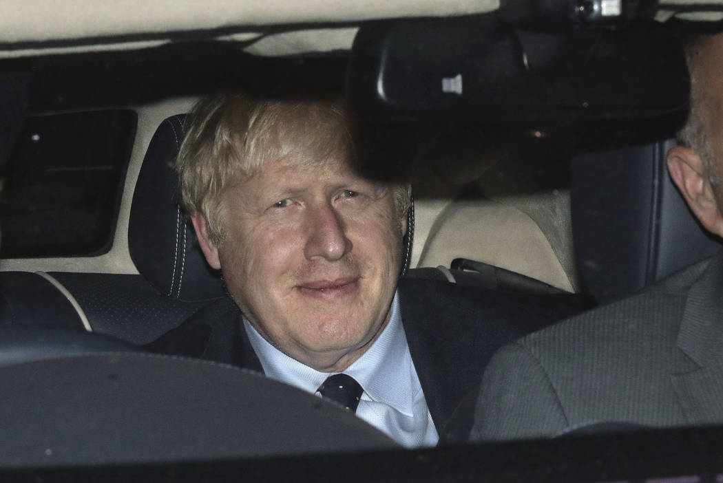 Prime Minister Boris Johnson leaves the House of Commons in London, Tuesday, Sept. 3, 2019, aft ...