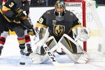 Golden Knights goaltender Marc-Andre Fleury (29) defends the goal while playing the New Jersey ...