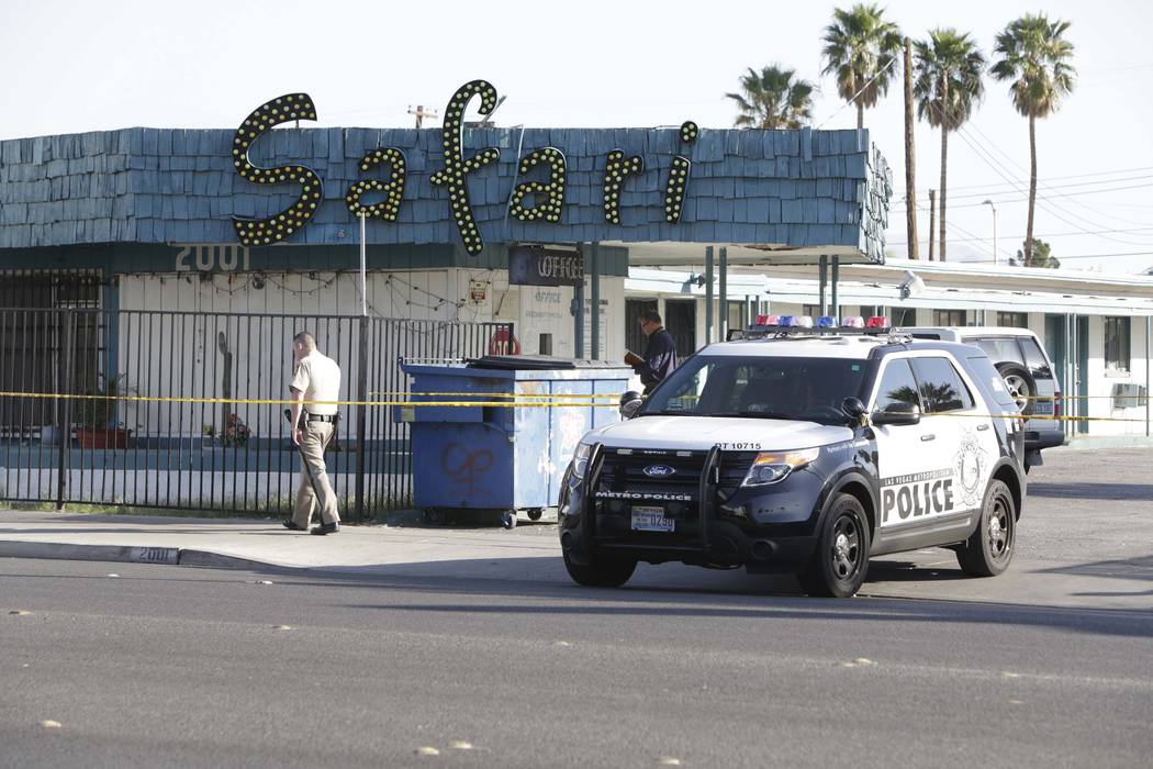 Las Vegas police investigate a fatal shooting at the Safari Motel, 2001 Fremont St., April 20, ...