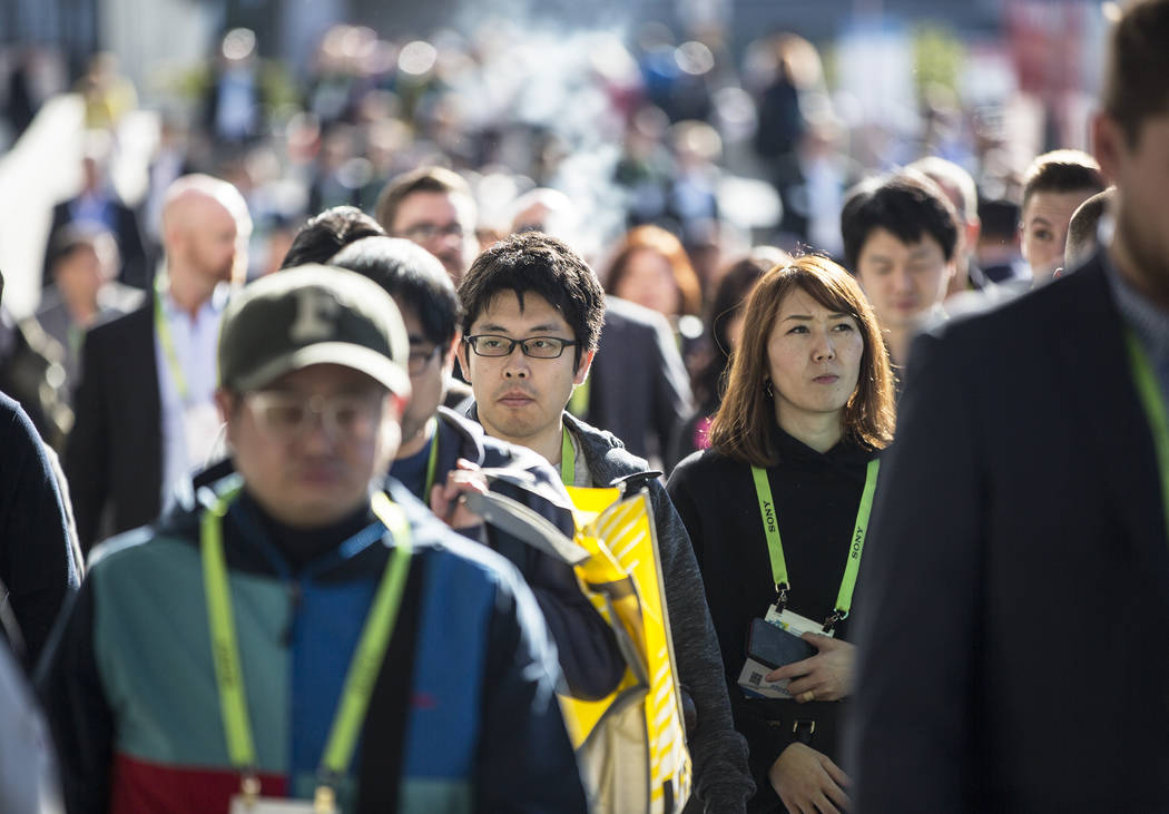 The sidewalks outside the Las Vegas Convention Center are packed during the second day of CES 2 ...