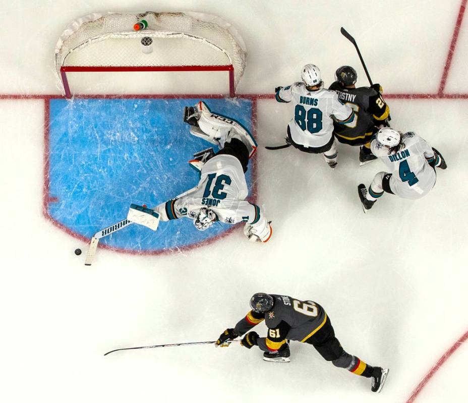 San Jose Sharks goaltender Martin Jones (31) reaches out to stop a shot on goal by Golden Knigh ...