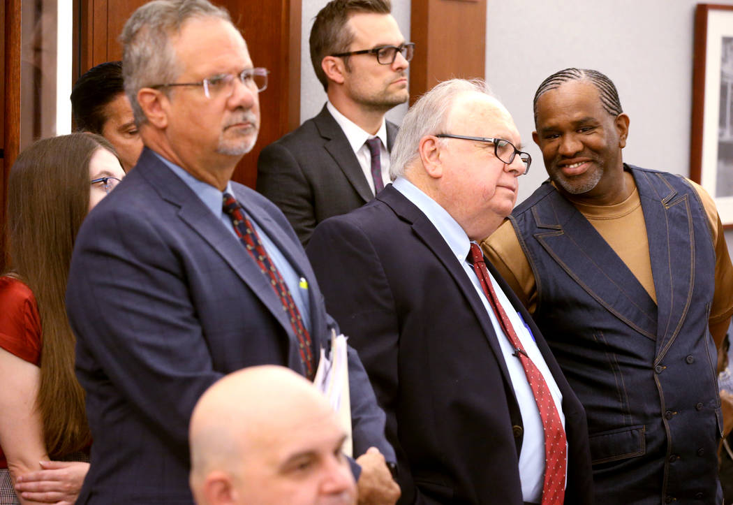 Defense attorney Ozzie Fumo, from left, his law partner Tom Pitaro and client, Ray Jefferson, a ...