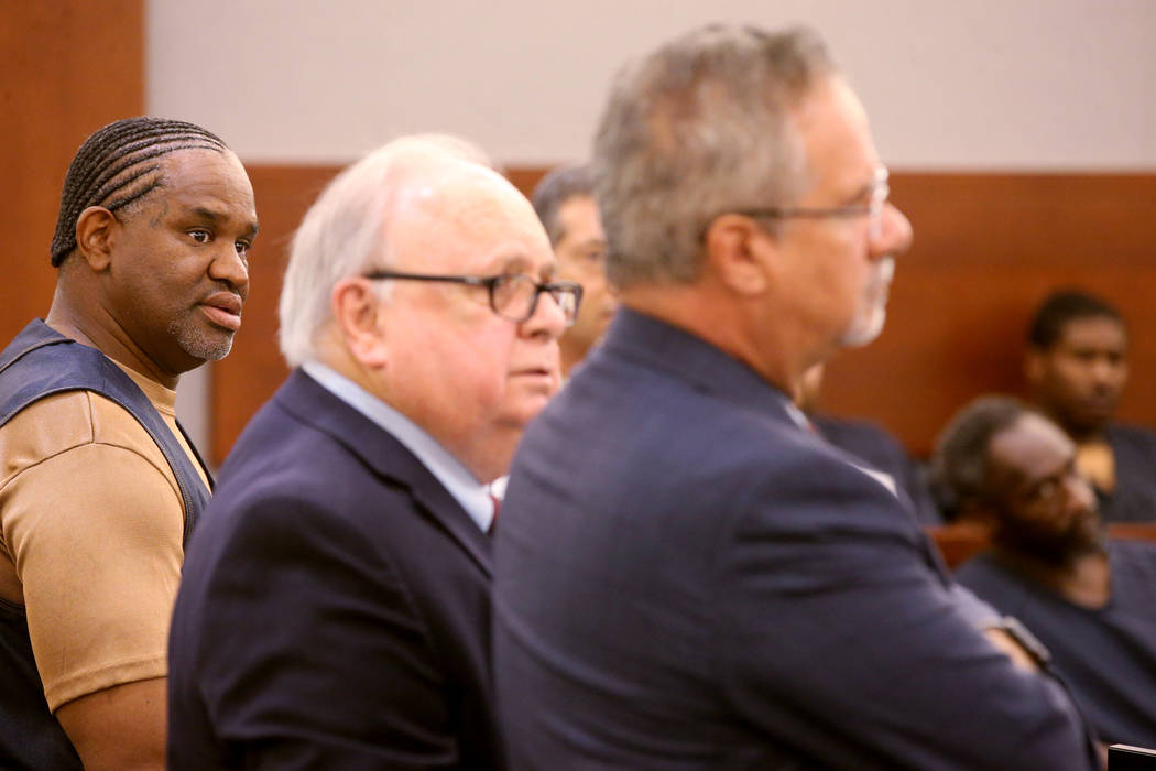 Defense attorney Ozzie Fumo, right, argues during a court hearing at the Regional Justice Cente ...