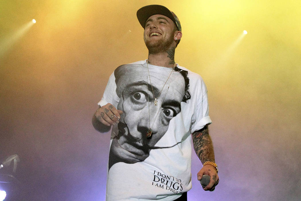 FILE - In this July 13, 2013, file photo, rapper Mac Miller performs on his Space Migration Tou ...