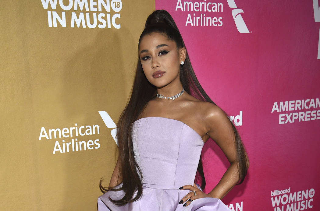 In a Thursday, Dec. 6, 2018 file photo, Ariana Grande attends the 13th annual Billboard Women i ...