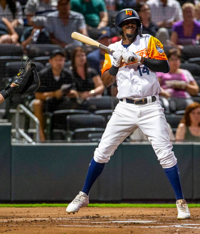 Las Vegas Aviators shortstop Jorge Mateo (14) is hit in the hand by a pitch by the Sacramento R ...